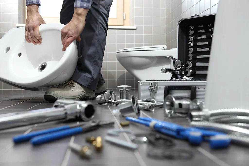 Plumbing tools prepared for a bathroom repair in Loveland